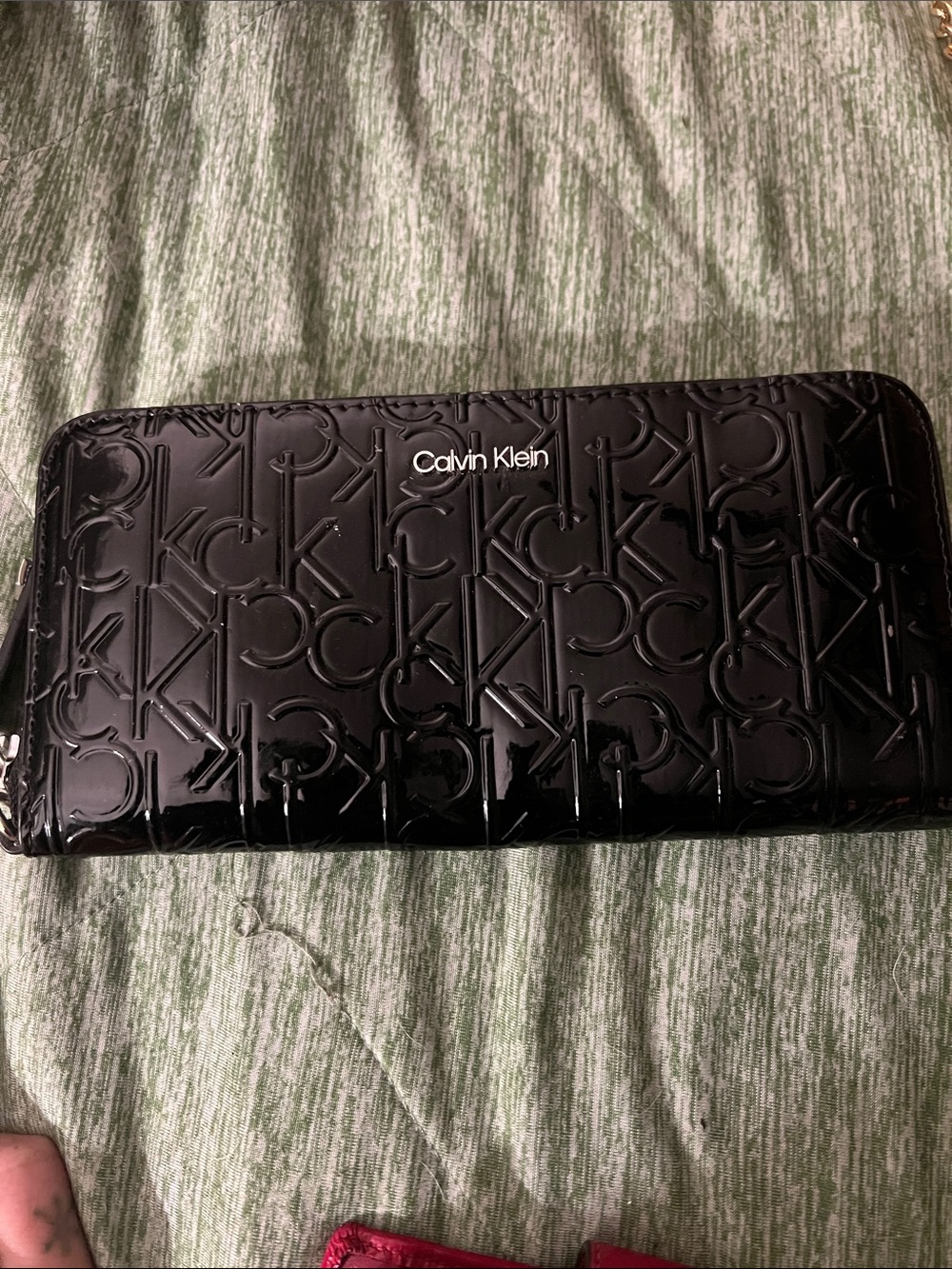 Calvin Klein Glossy Black Embossed Logo Zip Wallet